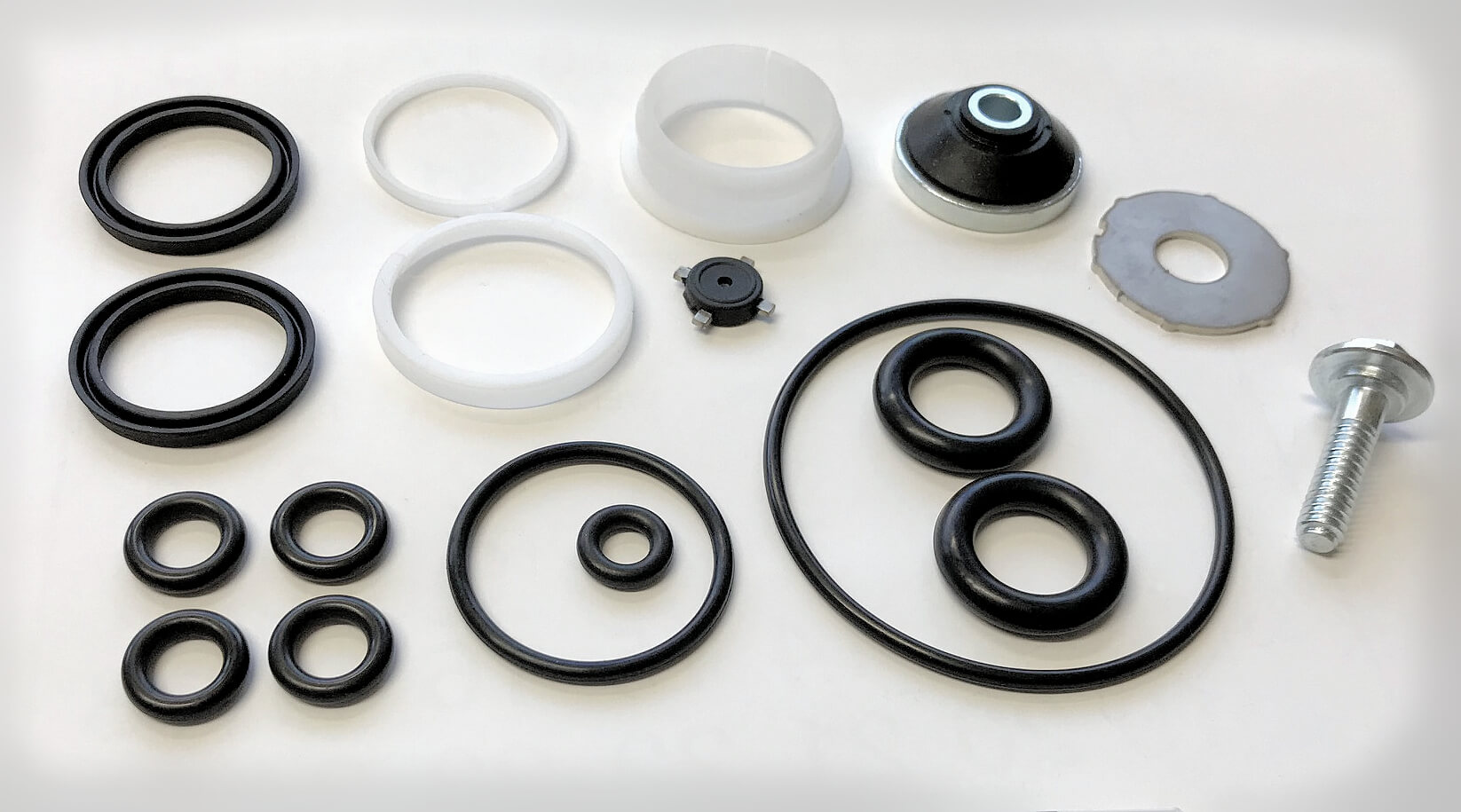ManuMark air brake repair kit laid out: nitrile O-rings, seals, guide rings, diaphragm and fixing screw