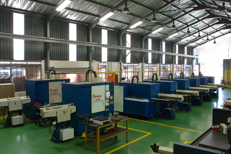 Automatic barfeeders on the Pitchline production line